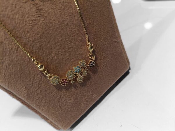 Elegant Floral Mangalsutra with Baby Blue Accents Kumar Sanjeev